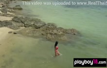 All natural asian Kahlisa showing her big tits and hairy pussy on the beach